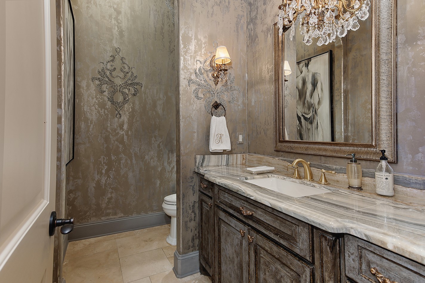 2 Lace Point The Woodlands, TX 77382 - Photo 9 of 48 a bathroom with a granite countertop sink and a mirror