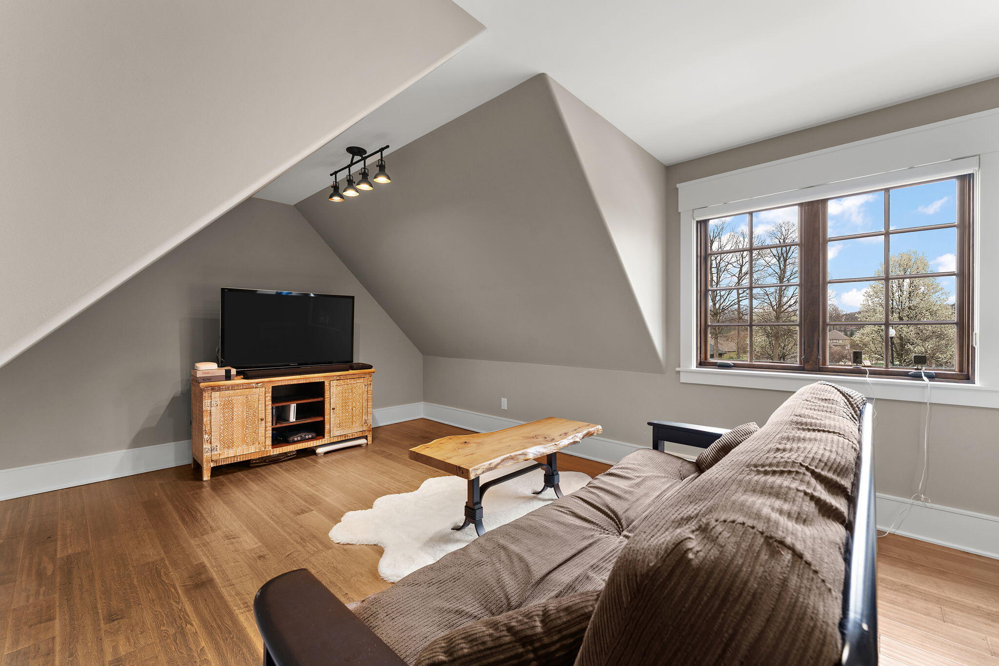 1021 Foy Court Crown Point, IN 46307 - Photo 45 of 88 a living room with furniture and a flat screen tv