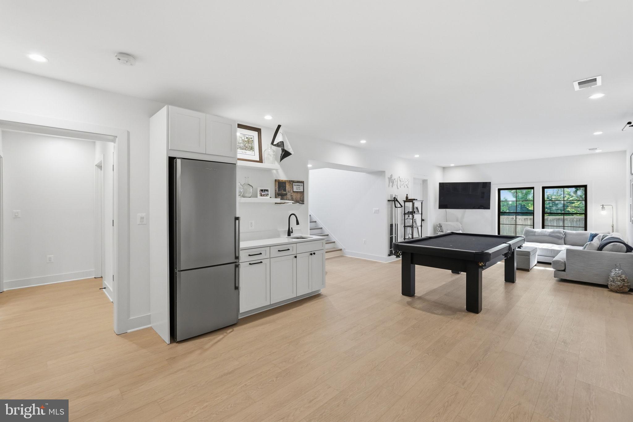 6026 Little Falls Road Arlington, VA 22207 - Photo 40 of 44 Lower level rec room with kitchenette