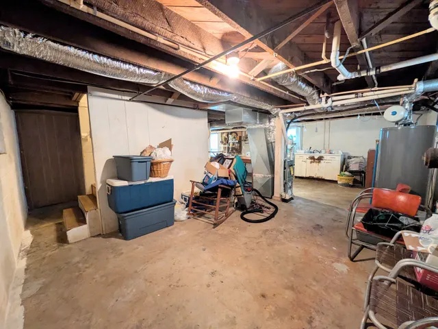 a view of a storage room with furniture
