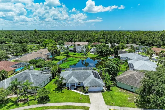 an aerial view of a house with a garden