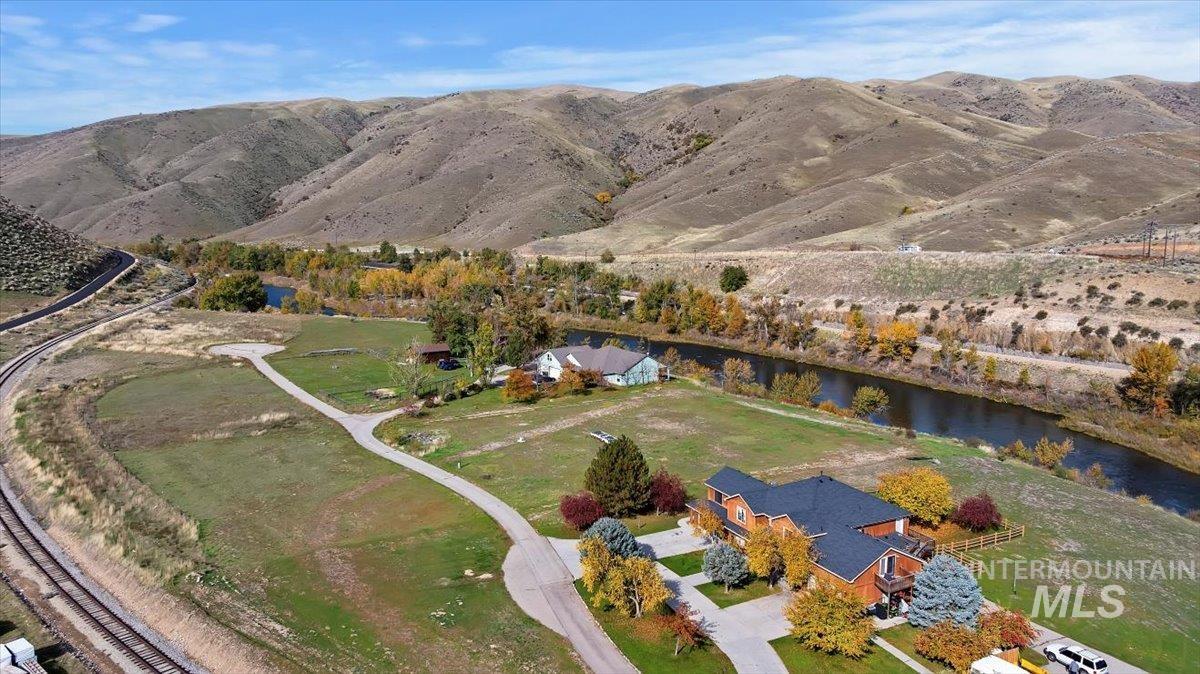 7 Mikylar Way Horseshoe Bend, ID 83629 - Photo 16 of 25 Aerial view of property and surrounding area featuring rural landscape