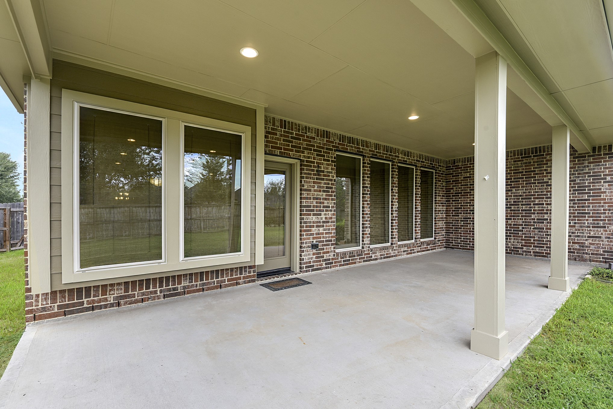 29023 Powder Ridge Drive Katy, TX 77494 - Photo 42 of 50 The generous covered patio offers true outdoor luxury—perfect for relaxing or hosting guests in any season, while also providing beautiful sunset views with no rear neighbors.