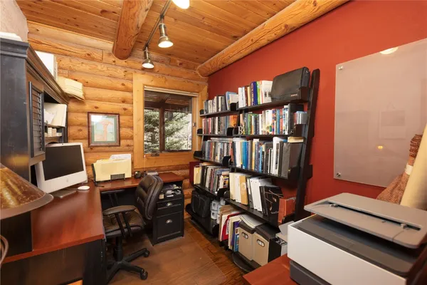 a view of a workspace with furniture