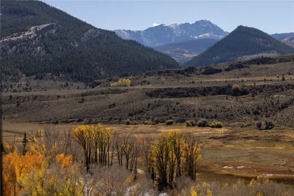 a view of a lake with mountains in the background