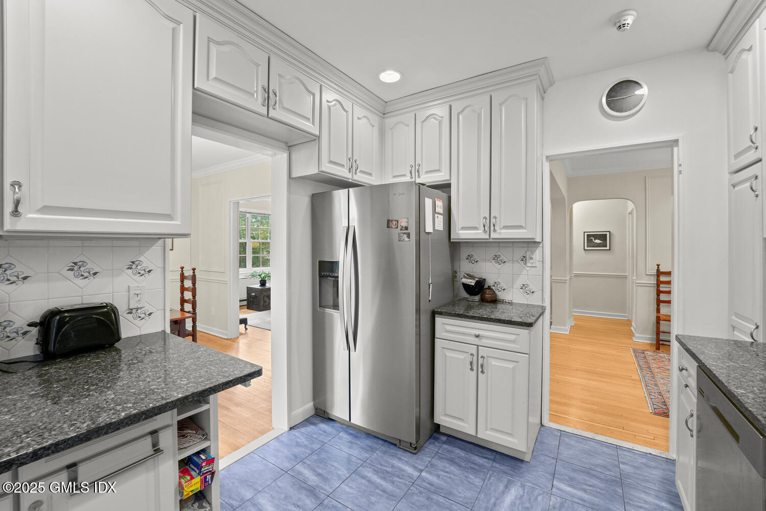 20 Church Street, Unit A34 Greenwich, CT 06830 - Photo 16 of 25 a kitchen with a refrigerator and a sink