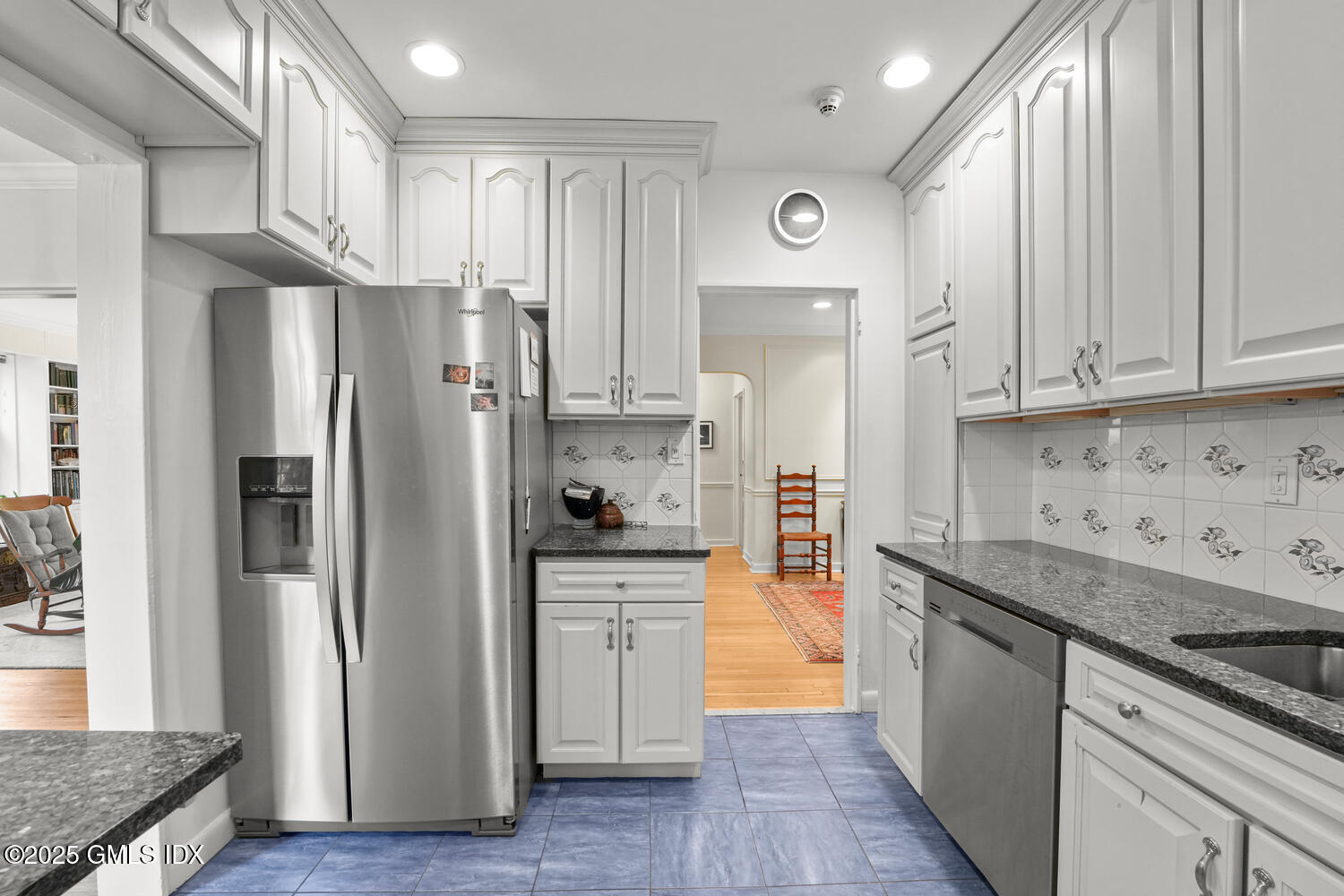 20 Church Street, Unit A34 Greenwich, CT 06830 - Photo 18 of 25 a kitchen with stainless steel appliances granite countertop a refrigerator and a stove