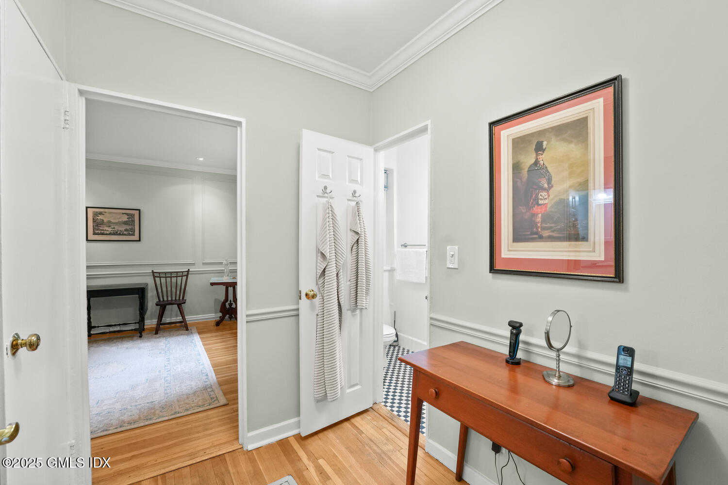 20 Church Street, Unit A34 Greenwich, CT 06830 - Photo 8 of 25 a bathroom with a sink a mirror and a shower