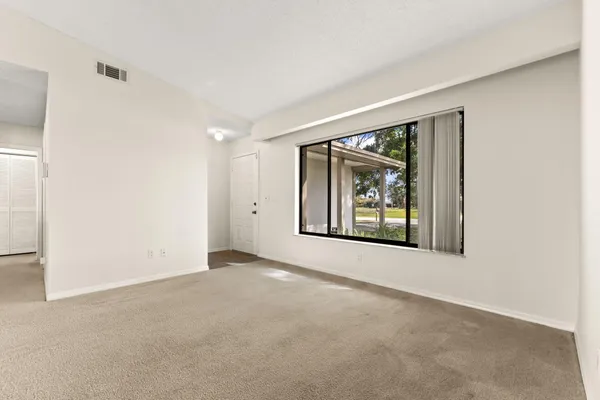 an empty room with window