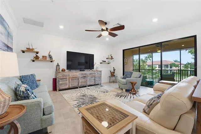 a kitchen with a sink stainless steel appliances and white cabinets