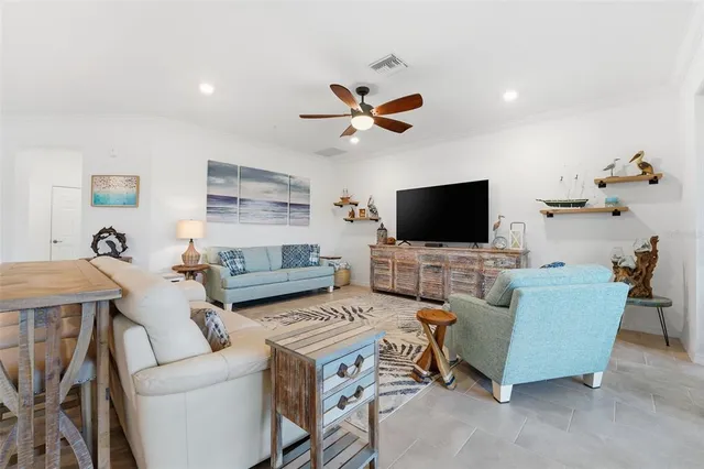 a large kitchen with kitchen island a sink a counter space and appliances