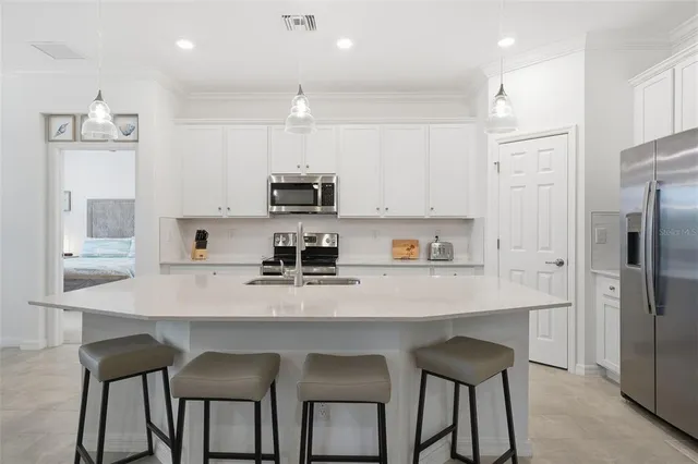 a view of a dining room with furniture and window
