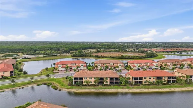 a view of a dining area with furniture and wooden floor