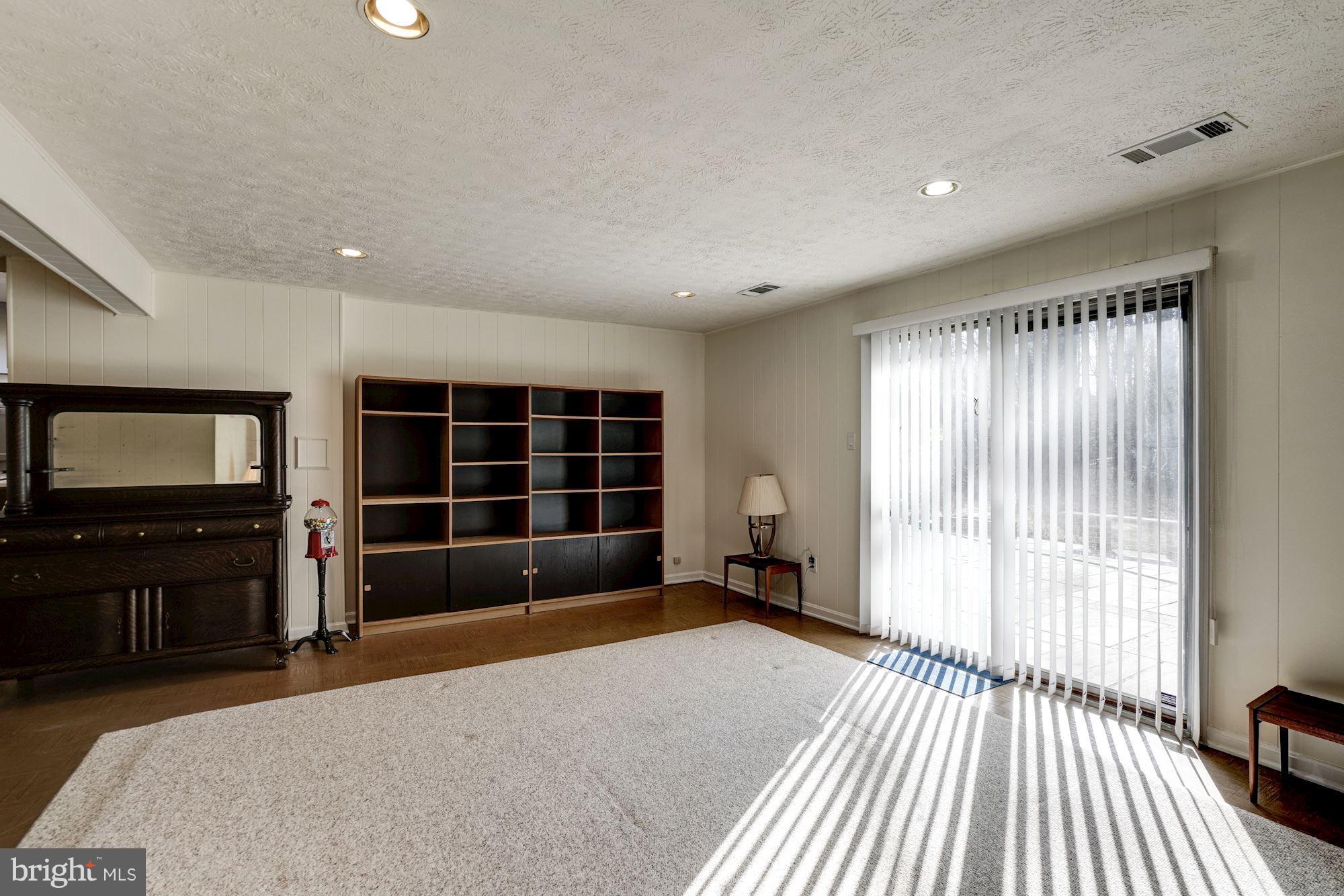 9317 Winbourne Road Burke, VA 22015 - Photo 22 of 28 Family Room walks out to great patio area.