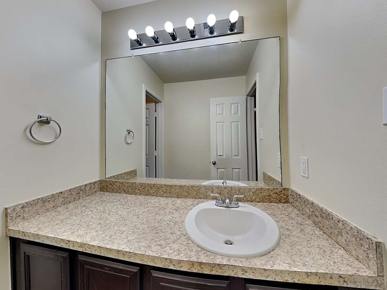 3719 Iris Ridge Way Fresno, TX 77545 - Photo 15 of 16 a bathroom with a granite countertop sink and a mirror