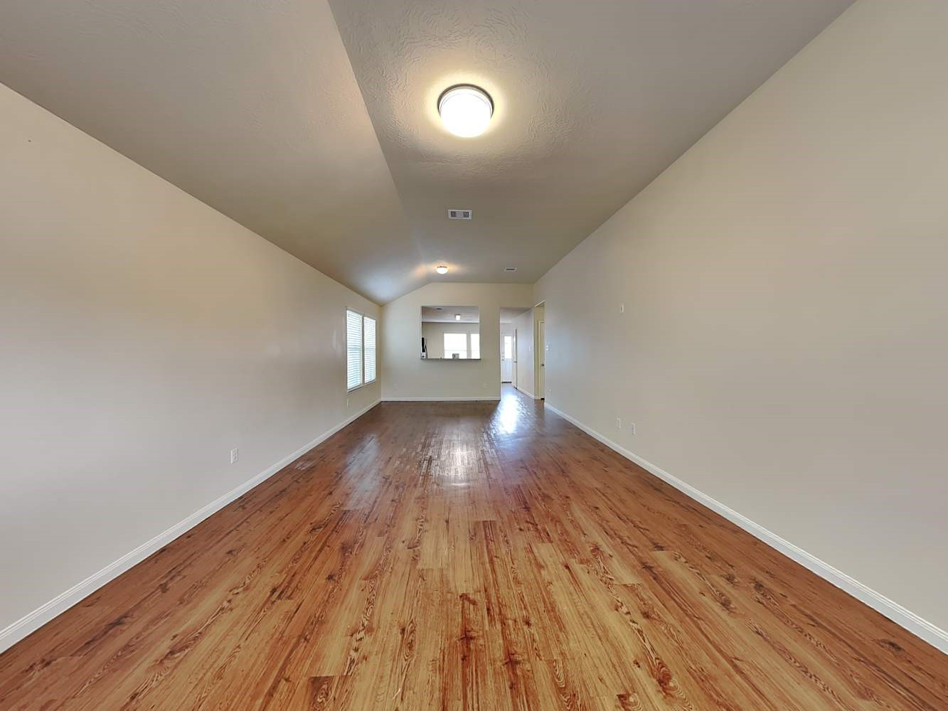 3719 Iris Ridge Way Fresno, TX 77545 - Photo 3 of 16 a view of empty room with wooden floor
