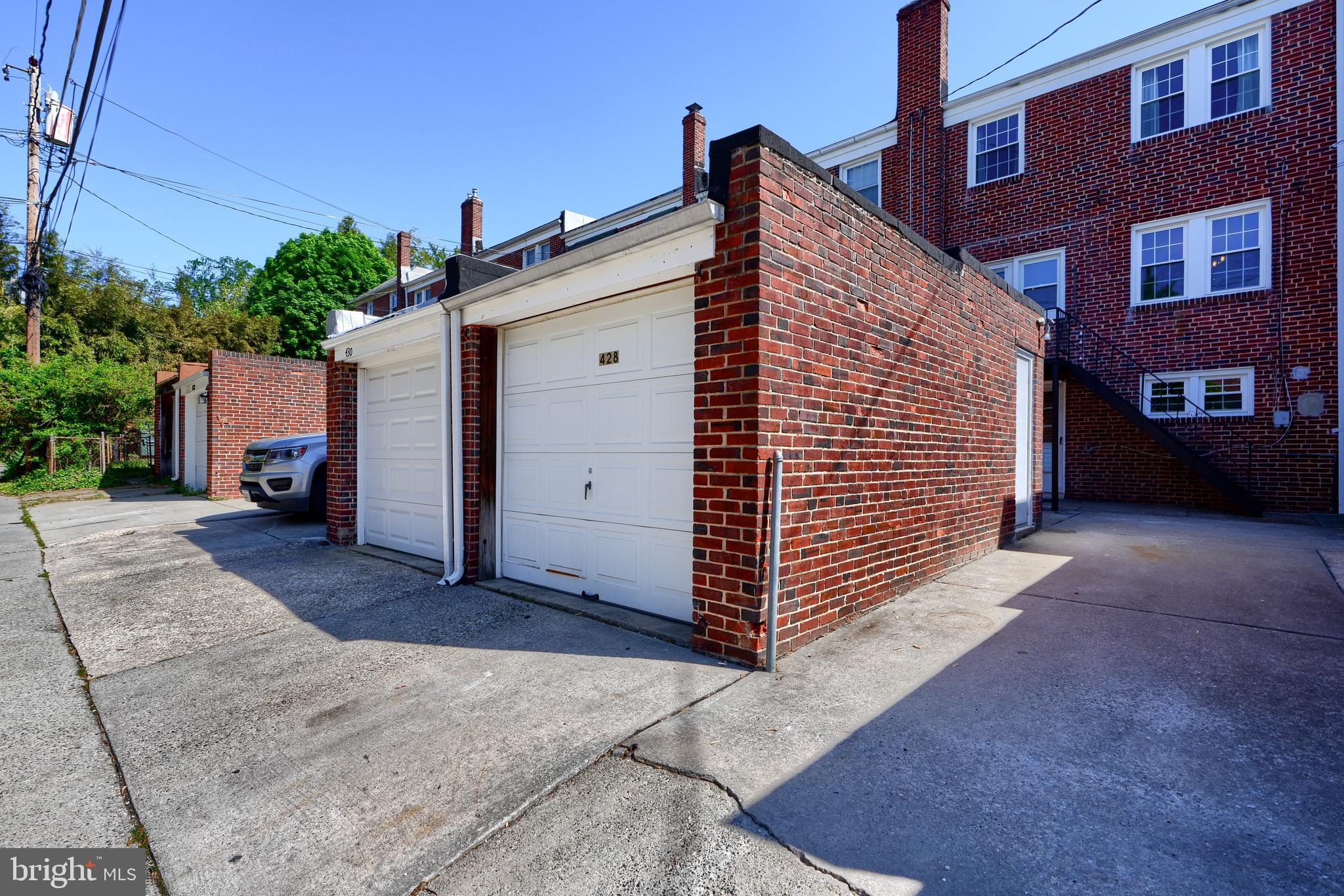 428 Overbrook Road Baltimore, MD 21228 - Photo 58 of 59 a view of a house with a yard and garage