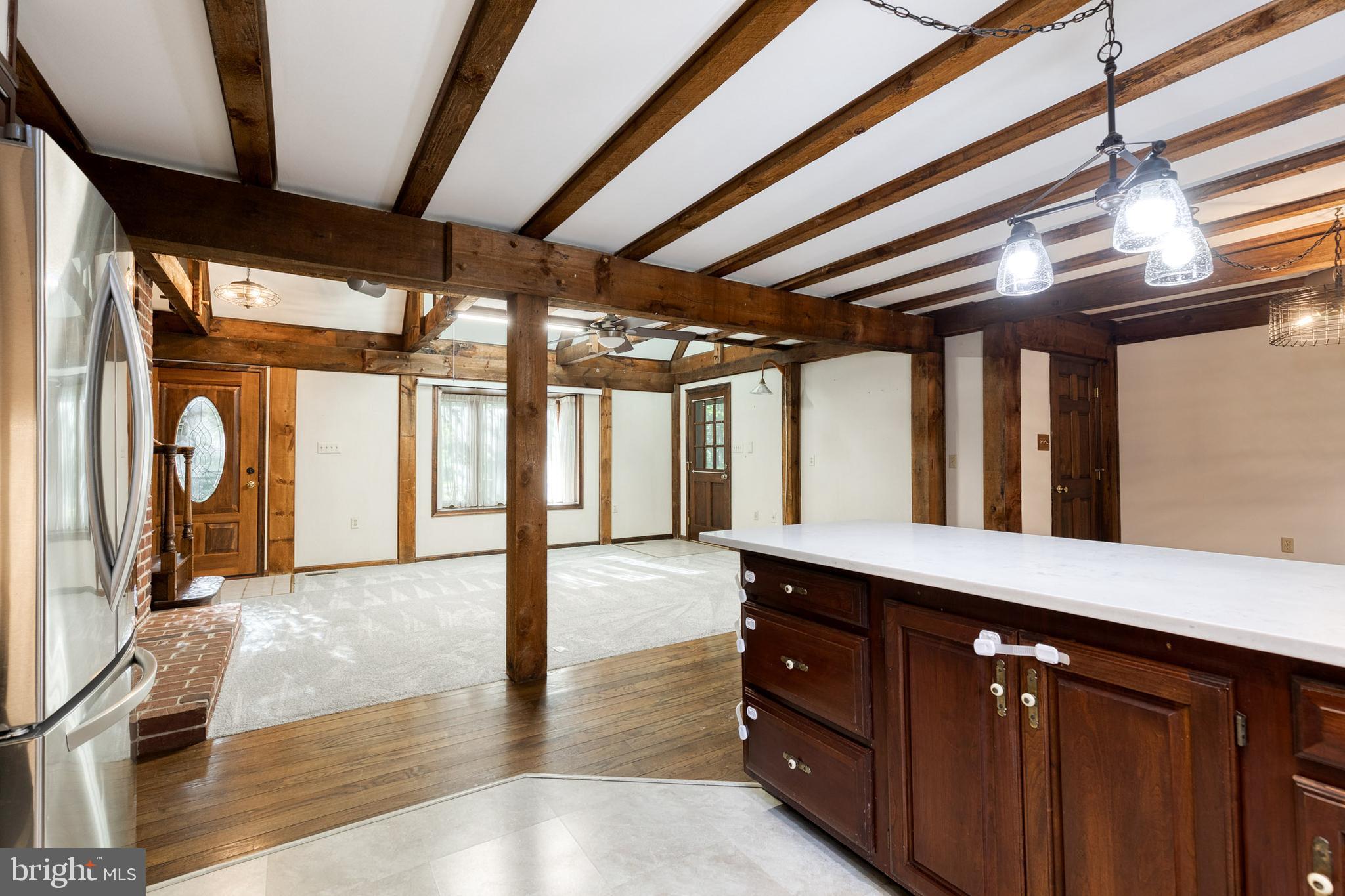 12610 Timber Grove Road Reisterstown, MD 21136 - Photo 11 of 39 a bathroom with a sink a mirror and a bathtub