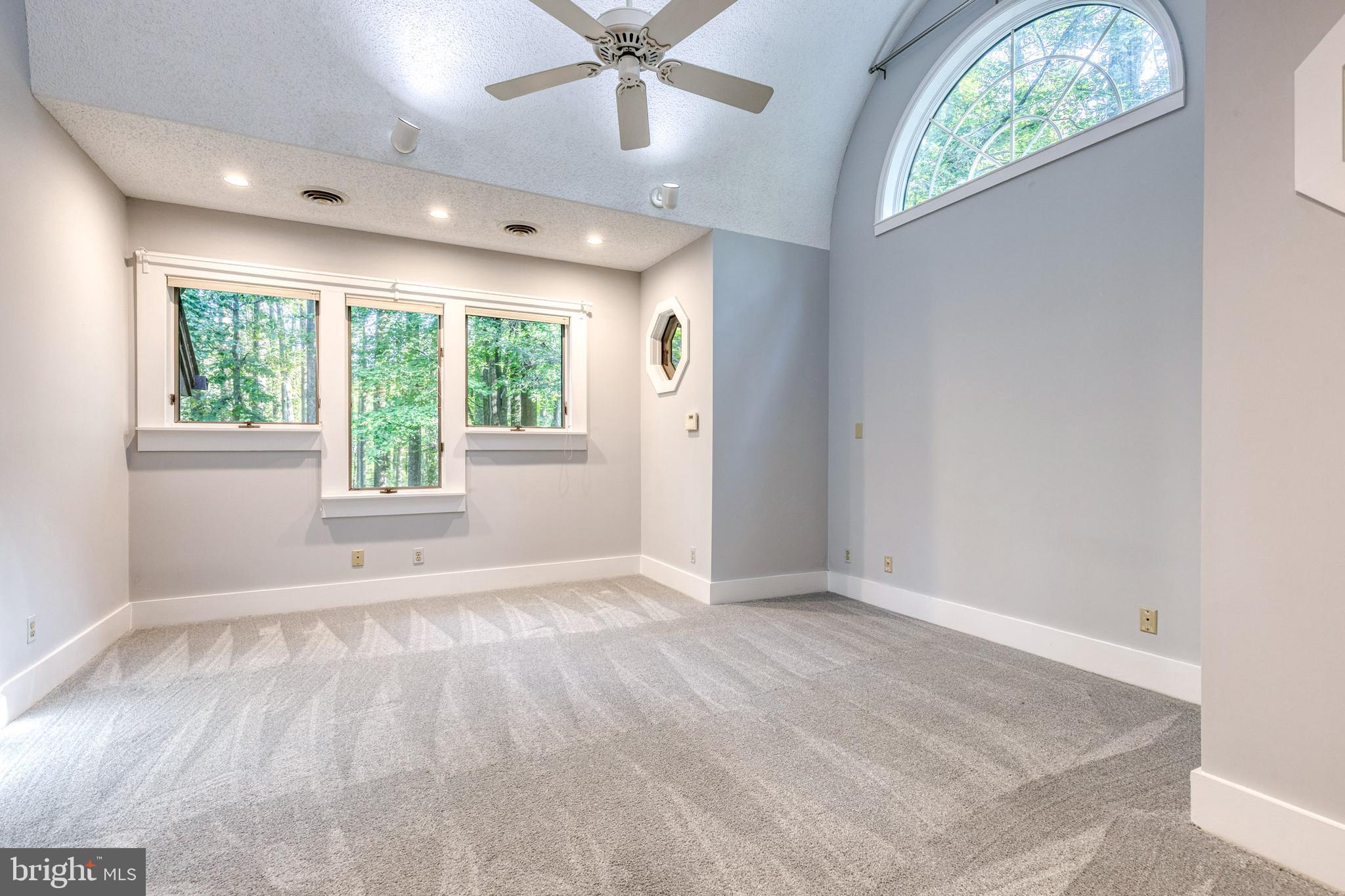 12610 Timber Grove Road Reisterstown, MD 21136 - Photo 16 of 39 a view of an empty room with a window