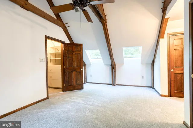 a view of empty room with windows