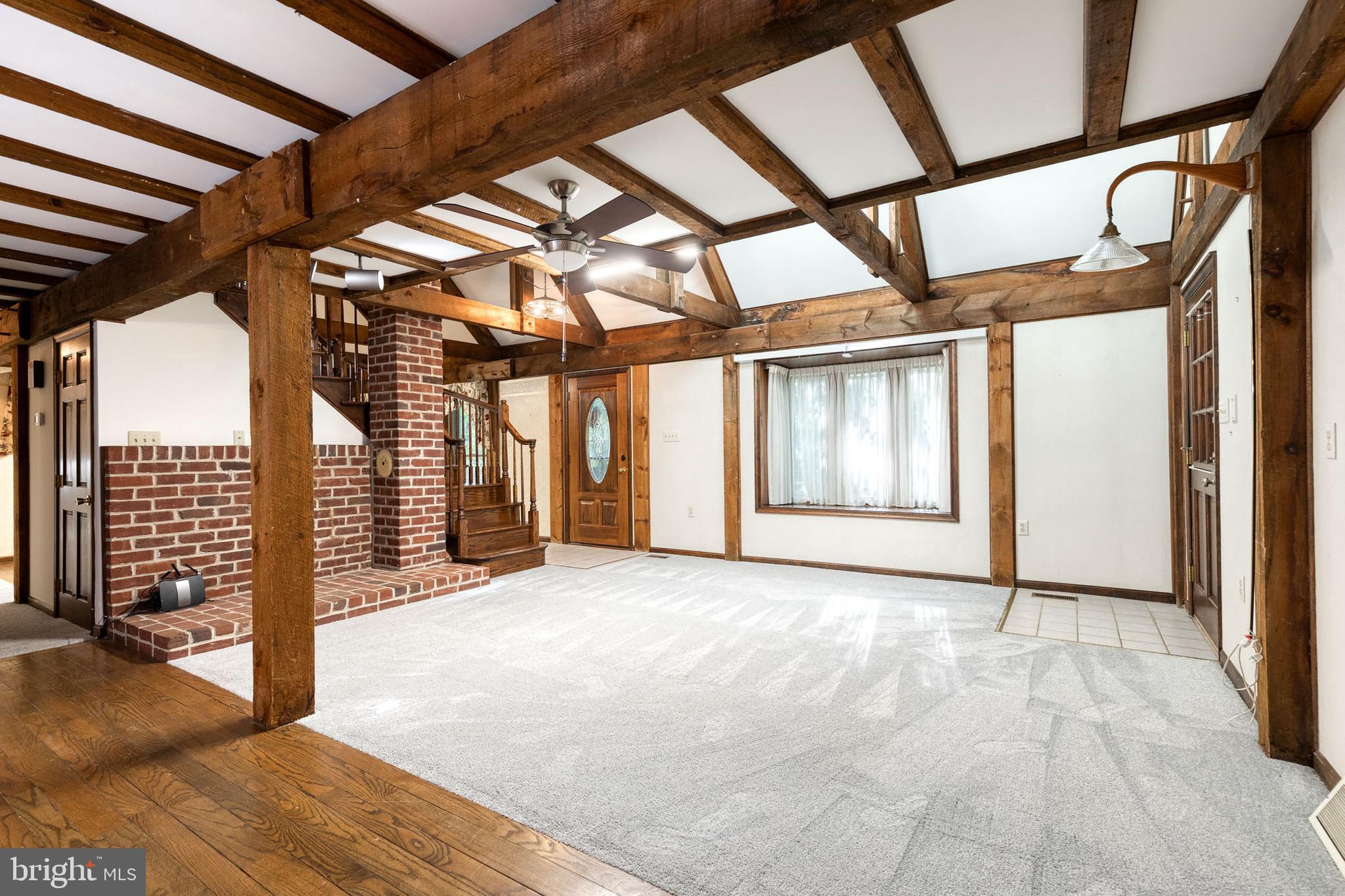 12610 Timber Grove Road Reisterstown, MD 21136 - Photo 6 of 39 a view of an empty room with a window