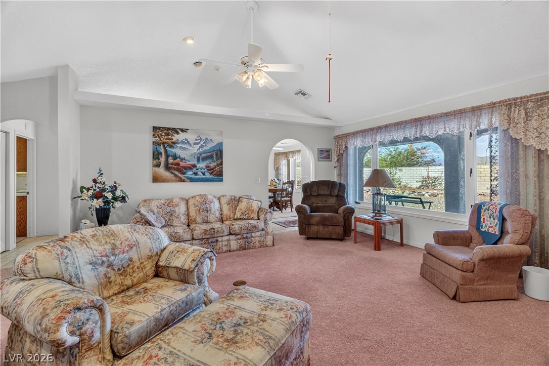 2055 Cholla Way Laughlin, NV 89029 - Photo 9 of 87 A spacious living area with an inviting window view and ample room for gathering.