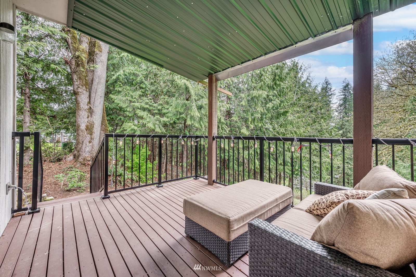 5531 East Wishon Road Snohomish, WA 98290 - Photo 26 of 36 a balcony with furniture and wooden floor