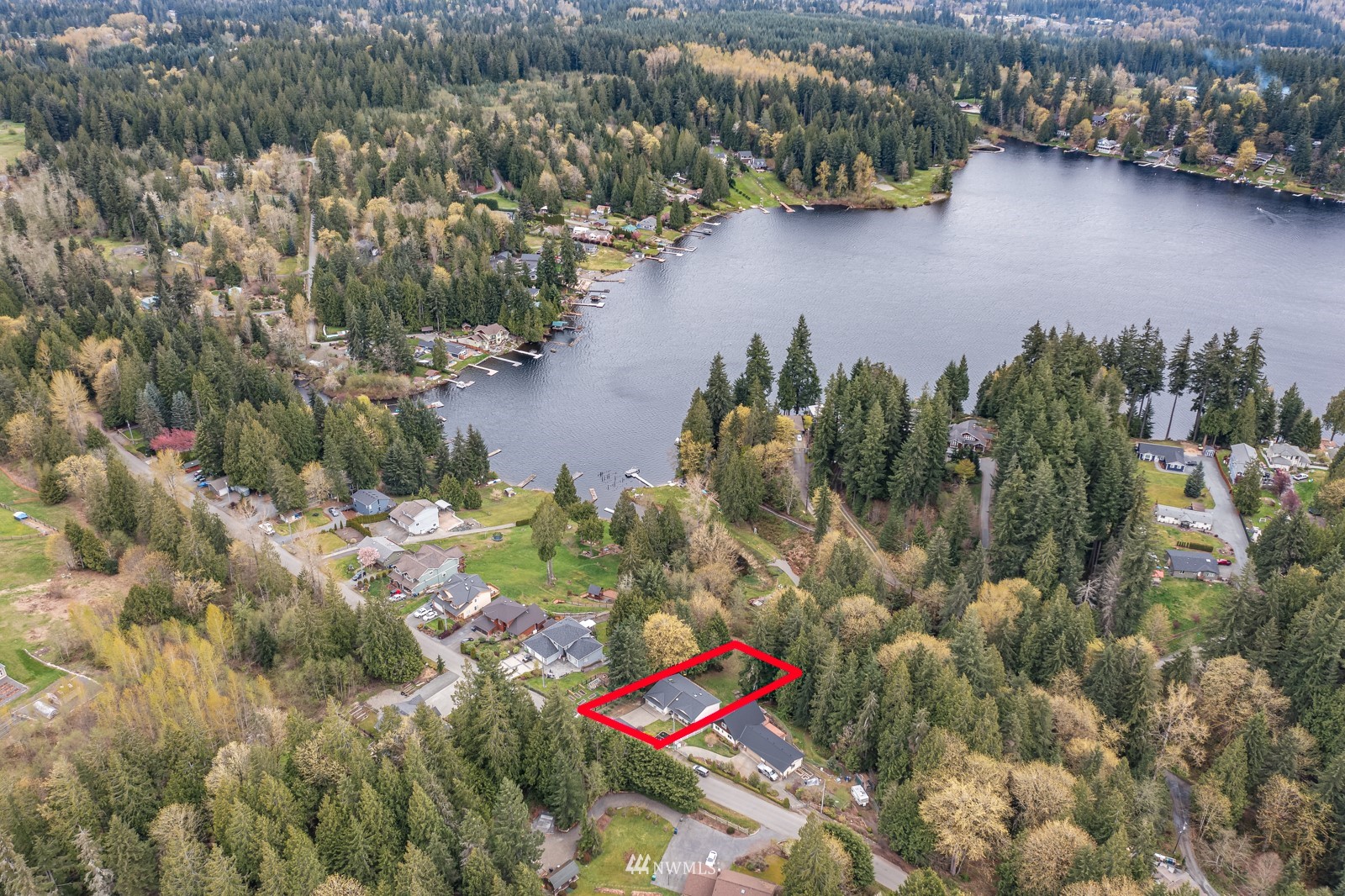 5531 East Wishon Road Snohomish, WA 98290 - Photo 36 of 36 an aerial view of a house with a yard and lake view