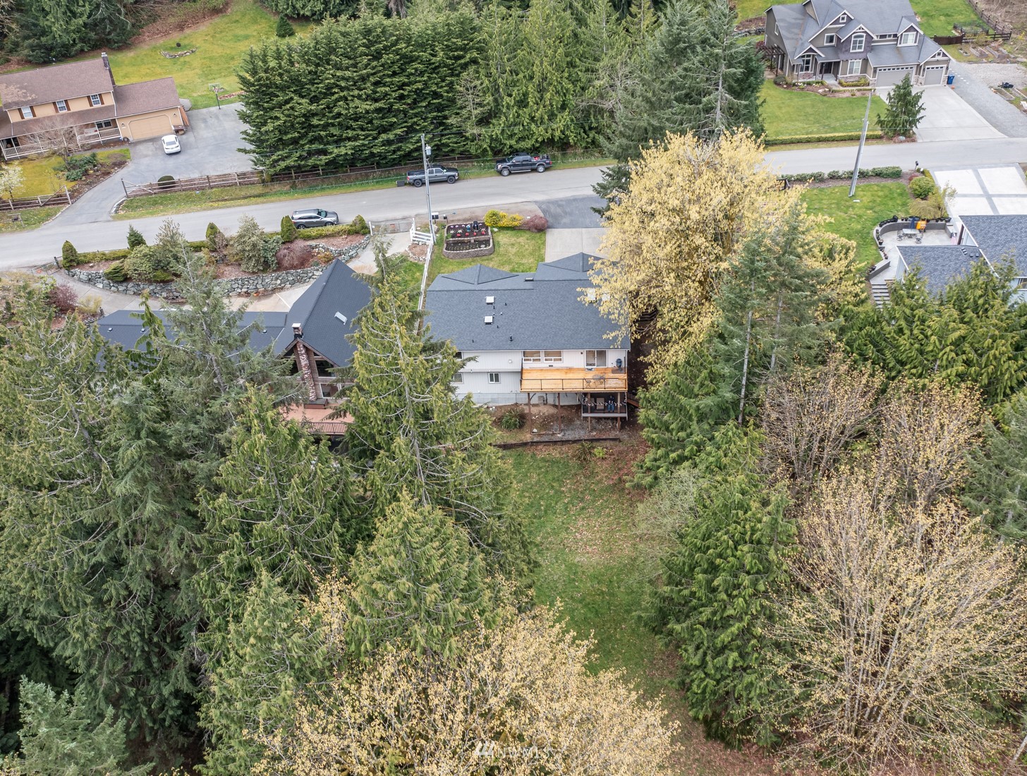 5531 East Wishon Road Snohomish, WA 98290 - Photo 4 of 36 an aerial view of residential houses with outdoor space and trees