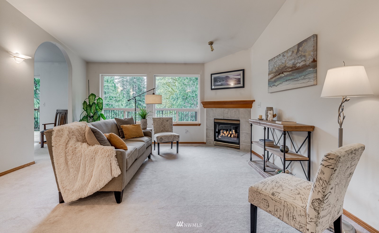 5531 East Wishon Road Snohomish, WA 98290 - Photo 5 of 36 a living room with furniture and a fireplace