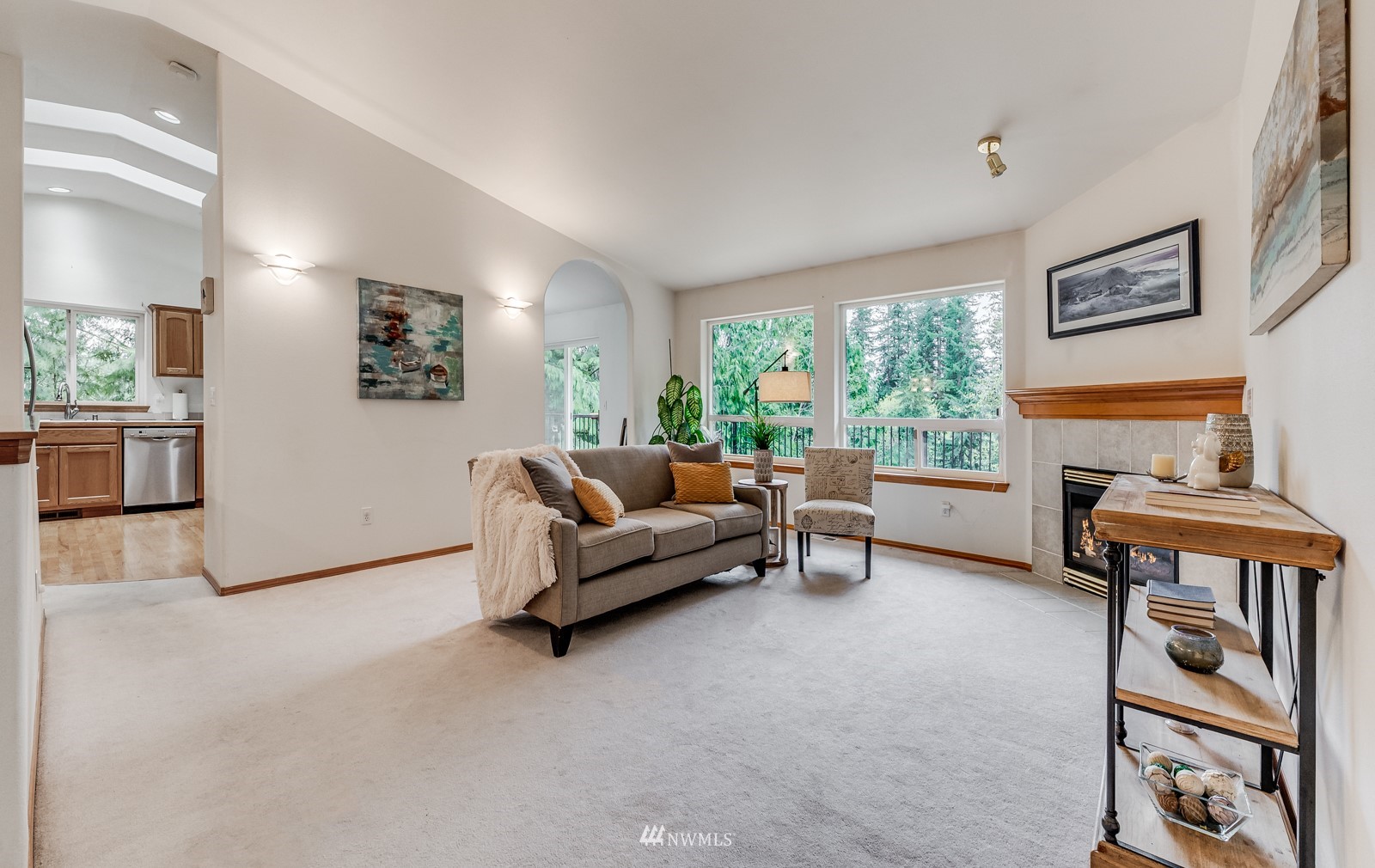5531 East Wishon Road Snohomish, WA 98290 - Photo 6 of 36 a living room with furniture and a fireplace