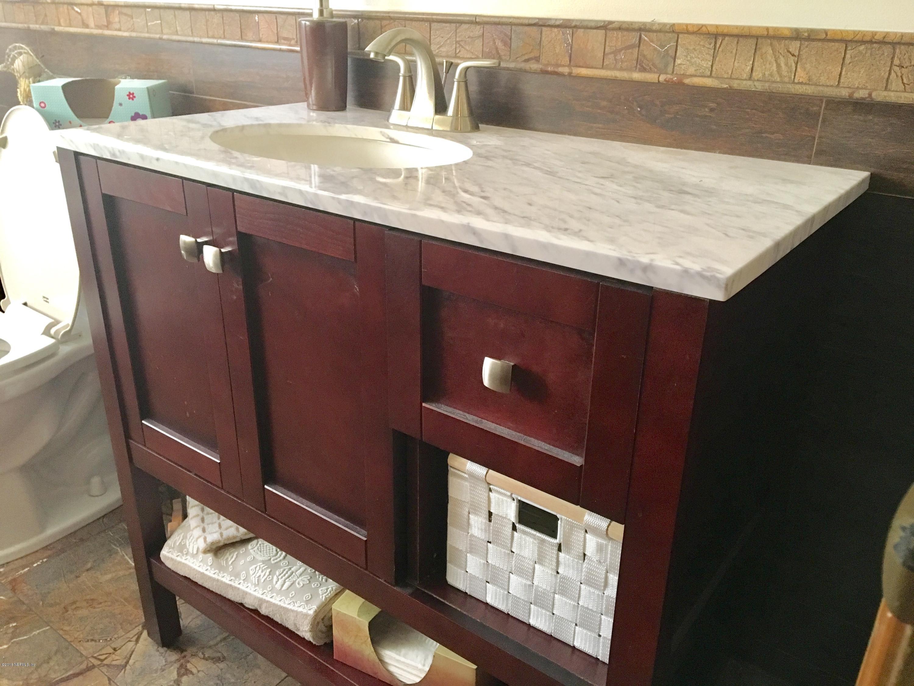 1745 Perry Road Green Cove Springs, FL 32043 - Photo 20 of 77 Hall bathroom vanity