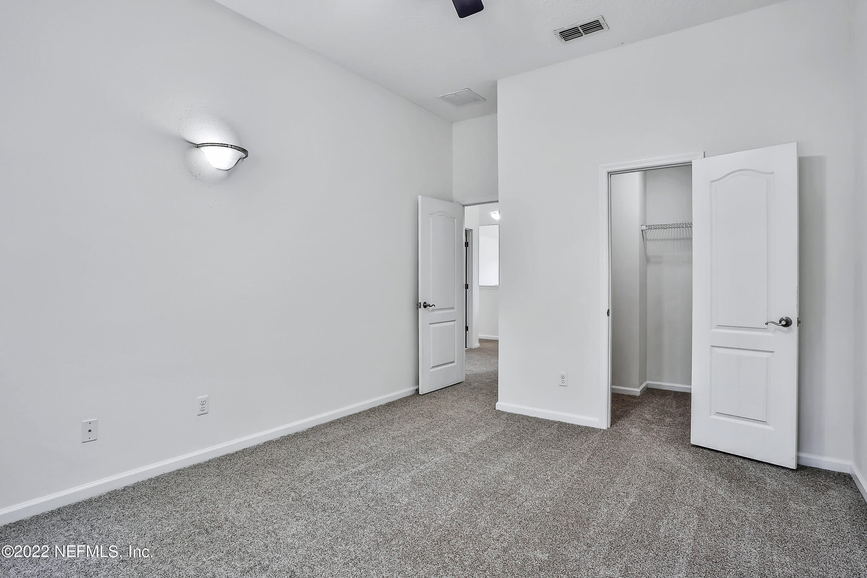 3698 American Holly Road Jacksonville, FL 32226 - Photo 22 of 34 Upstairs Bedroom 2 with Closet