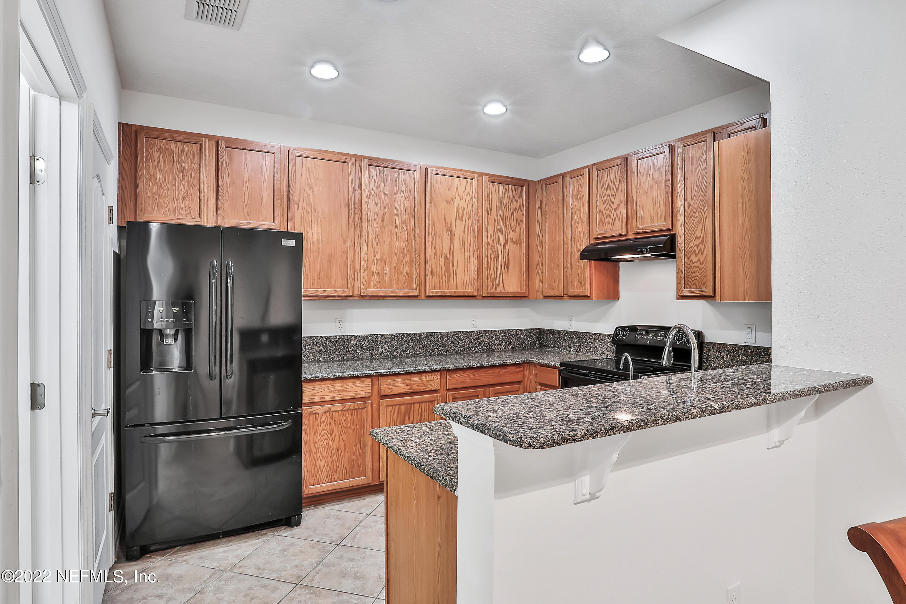 3698 American Holly Road Jacksonville, FL 32226 - Photo 4 of 34 Kitchen with Breakfast Bar