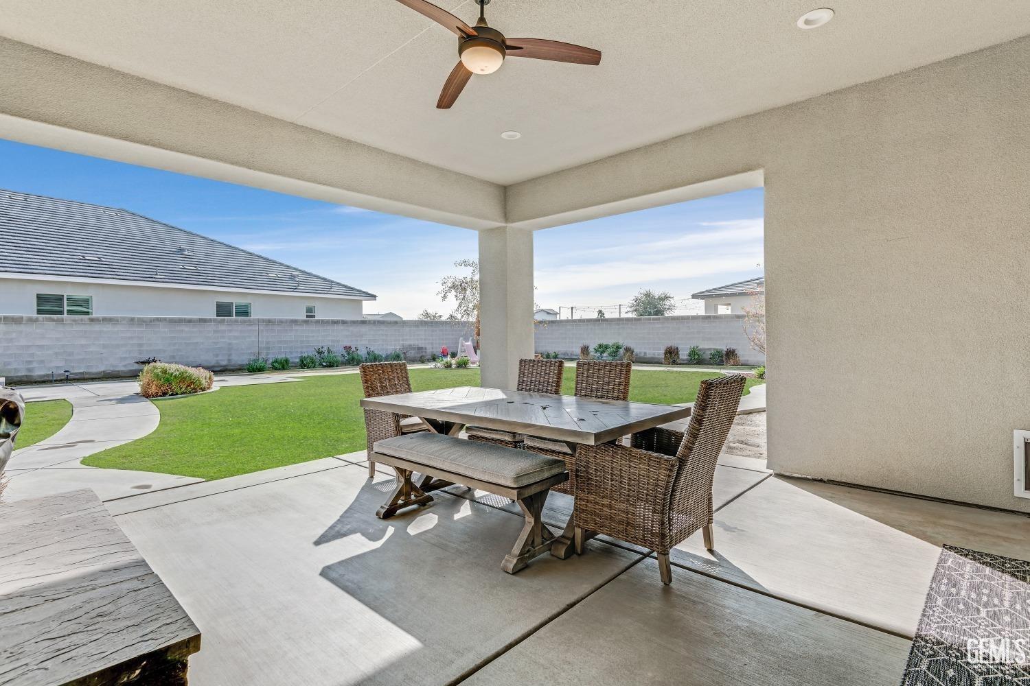 Undisclosed Address Bakersfield, CA 93311 - Photo 45 of 52 a view of a workspace with furniture and a window