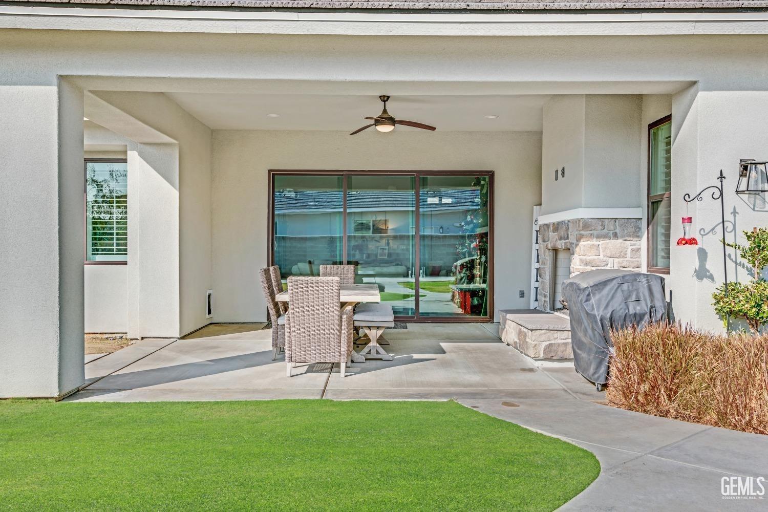 Undisclosed Address Bakersfield, CA 93311 - Photo 47 of 52 a living room with furniture and a window