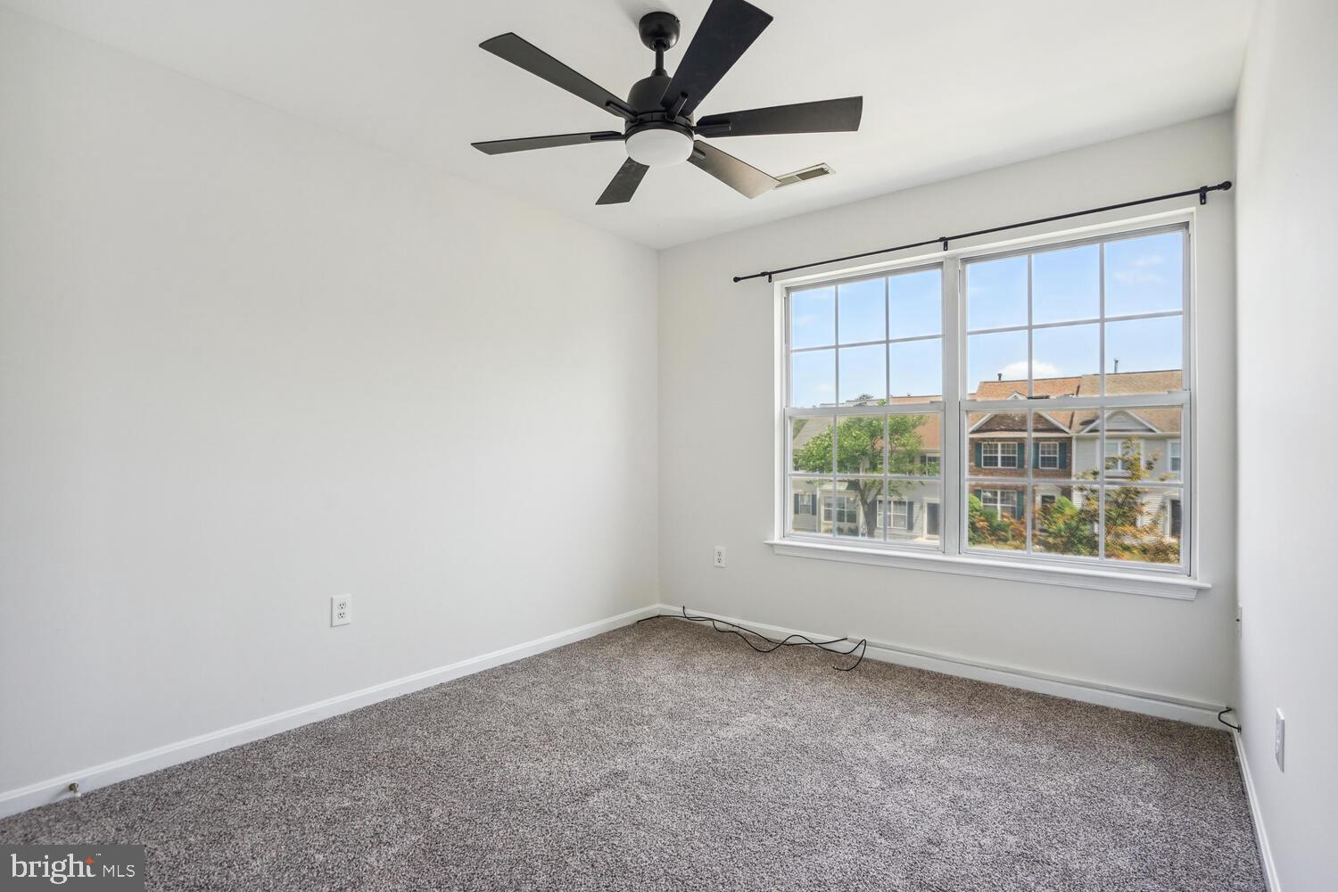 9205 Ridgefield Circle Frederick, MD 21701 - Photo 11 of 19 an empty room with a window and a fan