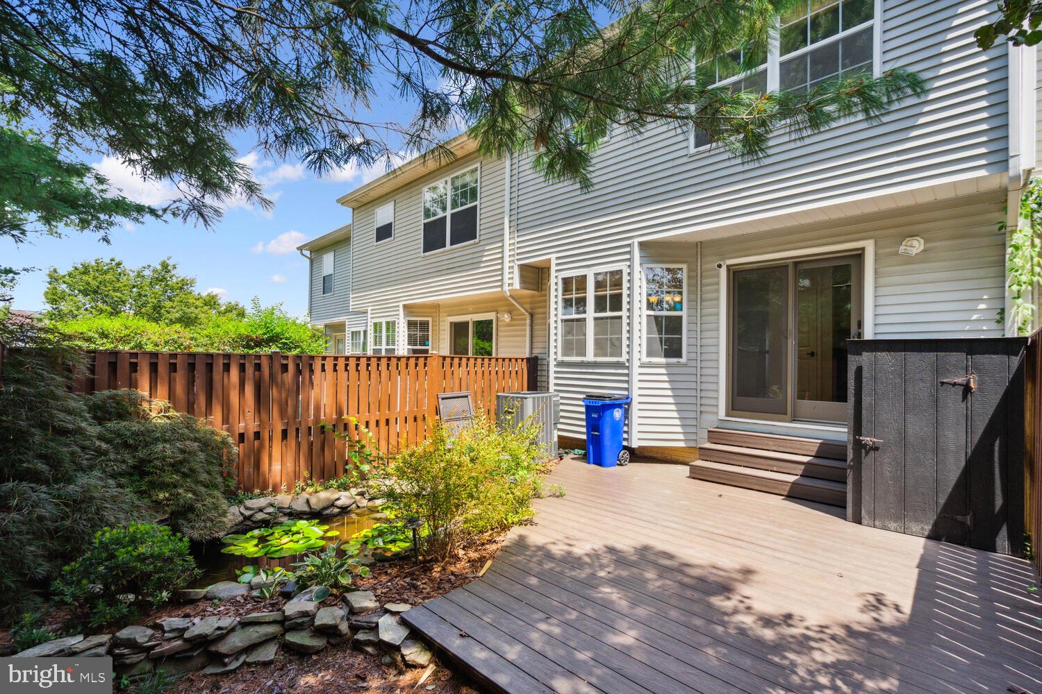 9205 Ridgefield Circle Frederick, MD 21701 - Photo 17 of 19 a front view of a house with a yard
