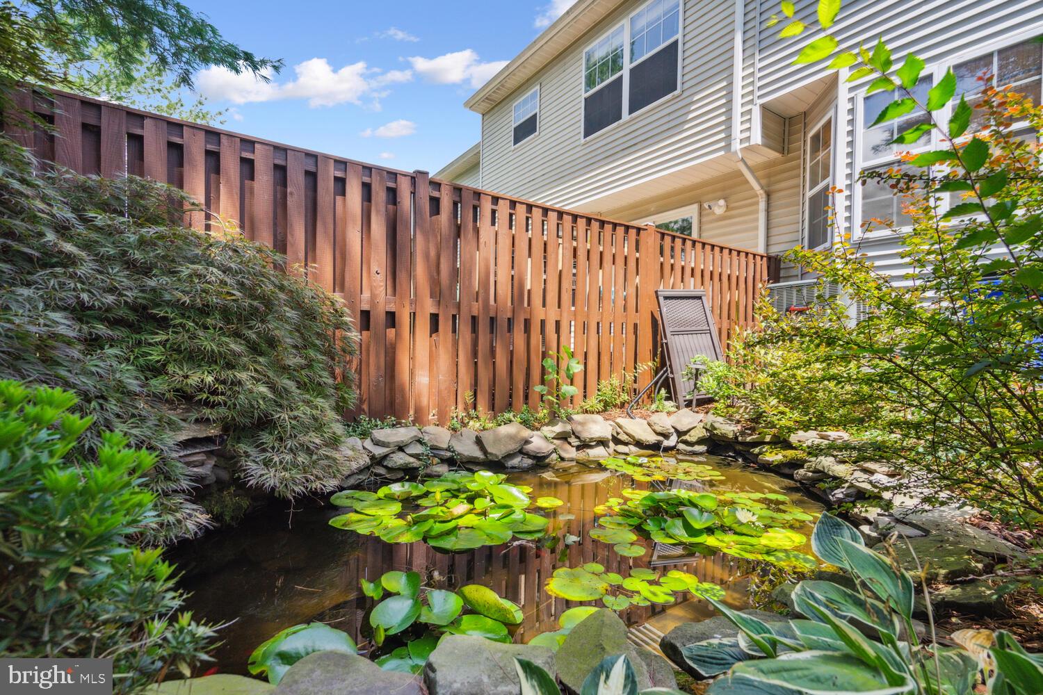 9205 Ridgefield Circle Frederick, MD 21701 - Photo 19 of 19 a backyard of a house with lots of green space