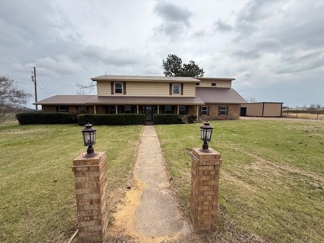 a front view of a house with swimming pool