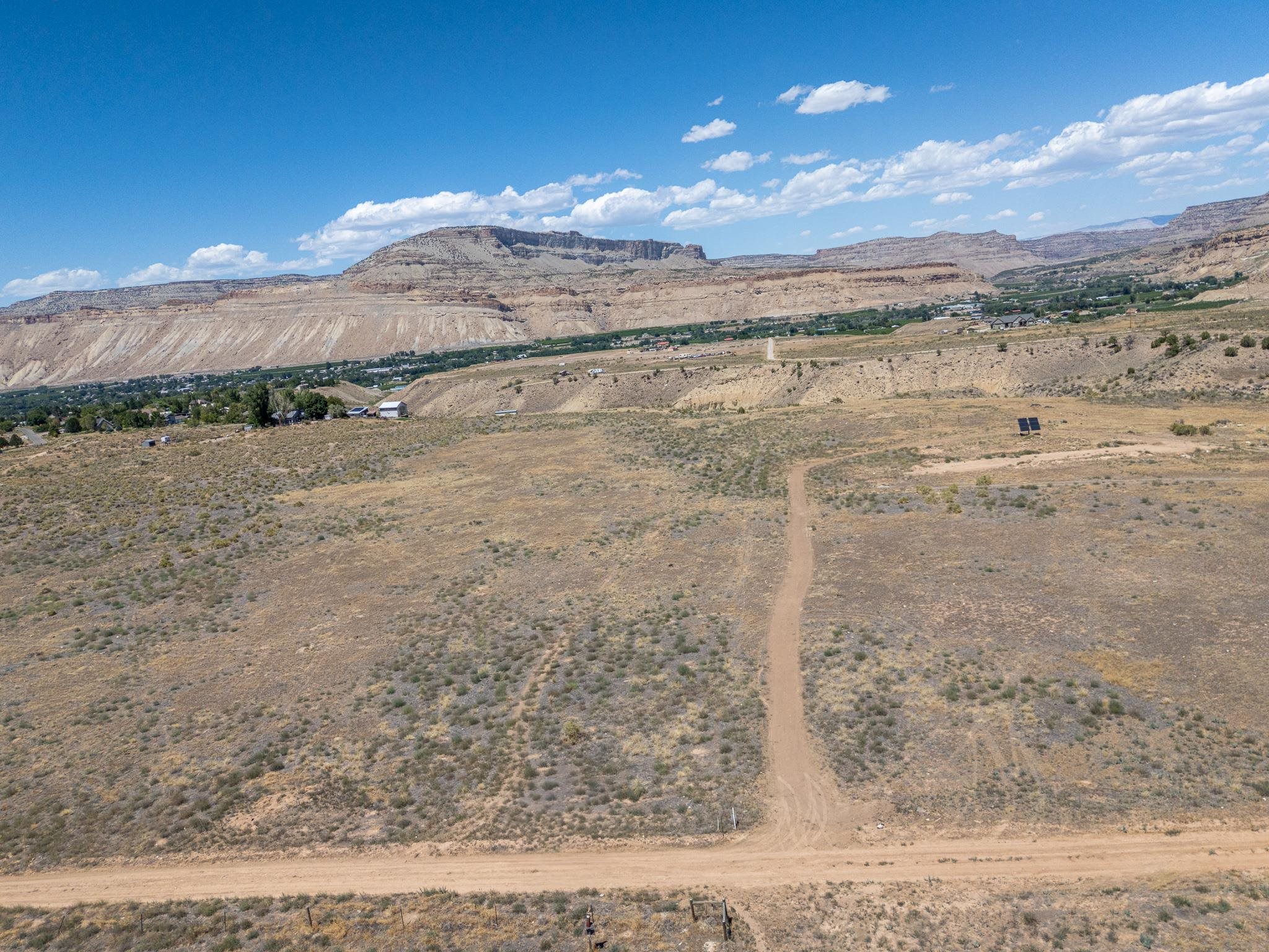 589 39 Road Palisade, CO 81526 - Photo 21 of 40 a view of an ocean beach and mountain