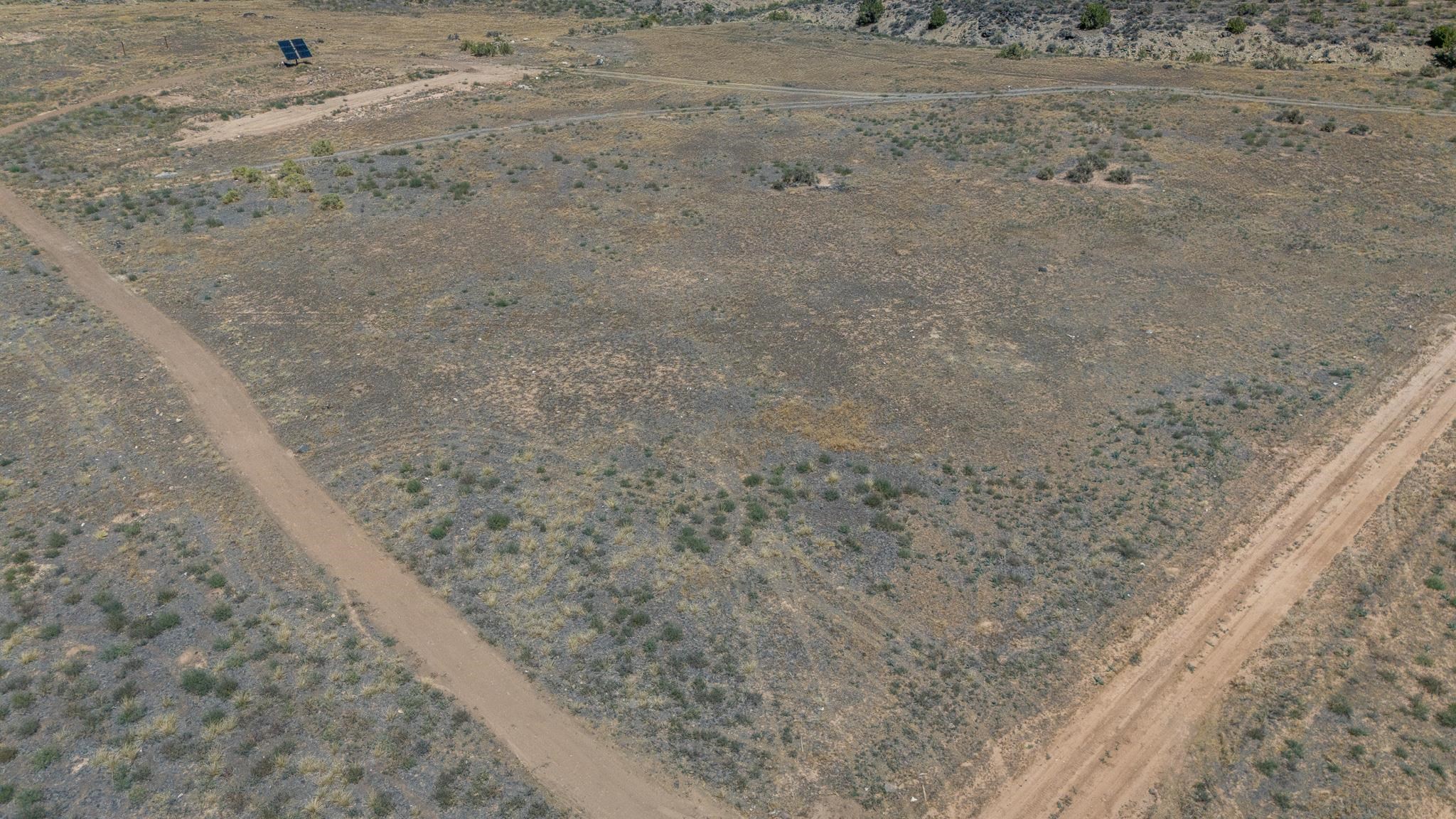 589 39 Road Palisade, CO 81526 - Photo 7 of 40 a view of a dry yard with wooden fence