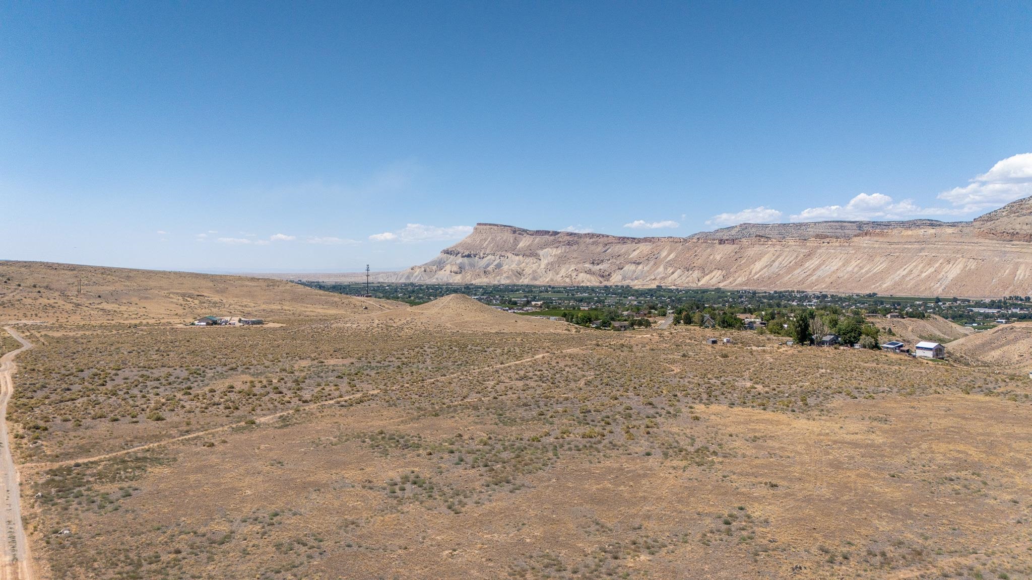 589 39 Road Palisade, CO 81526 - Photo 8 of 40 a view of an ocean beach and mountain