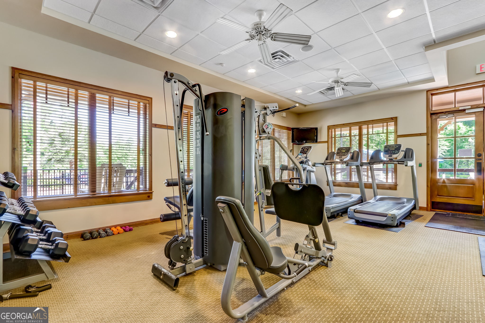 115 Tidal Marsh Way St. Marys, GA 31558 - Photo 11 of 17 a view of a room with gym equipment