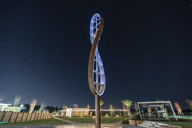 a front view of a building with parking