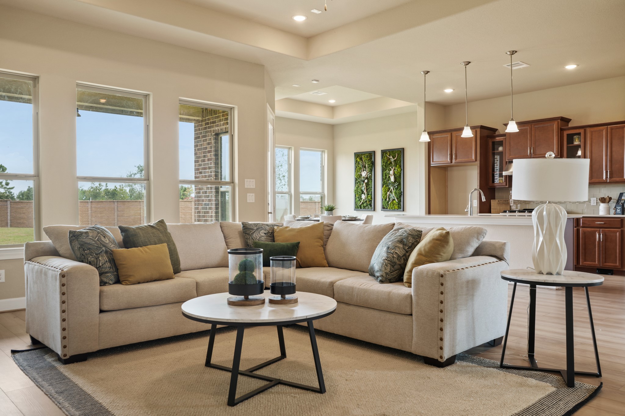 5602 Caracara Street Manvel, TX 77578 - Photo 3 of 15 a living room with furniture kitchen view and a large window