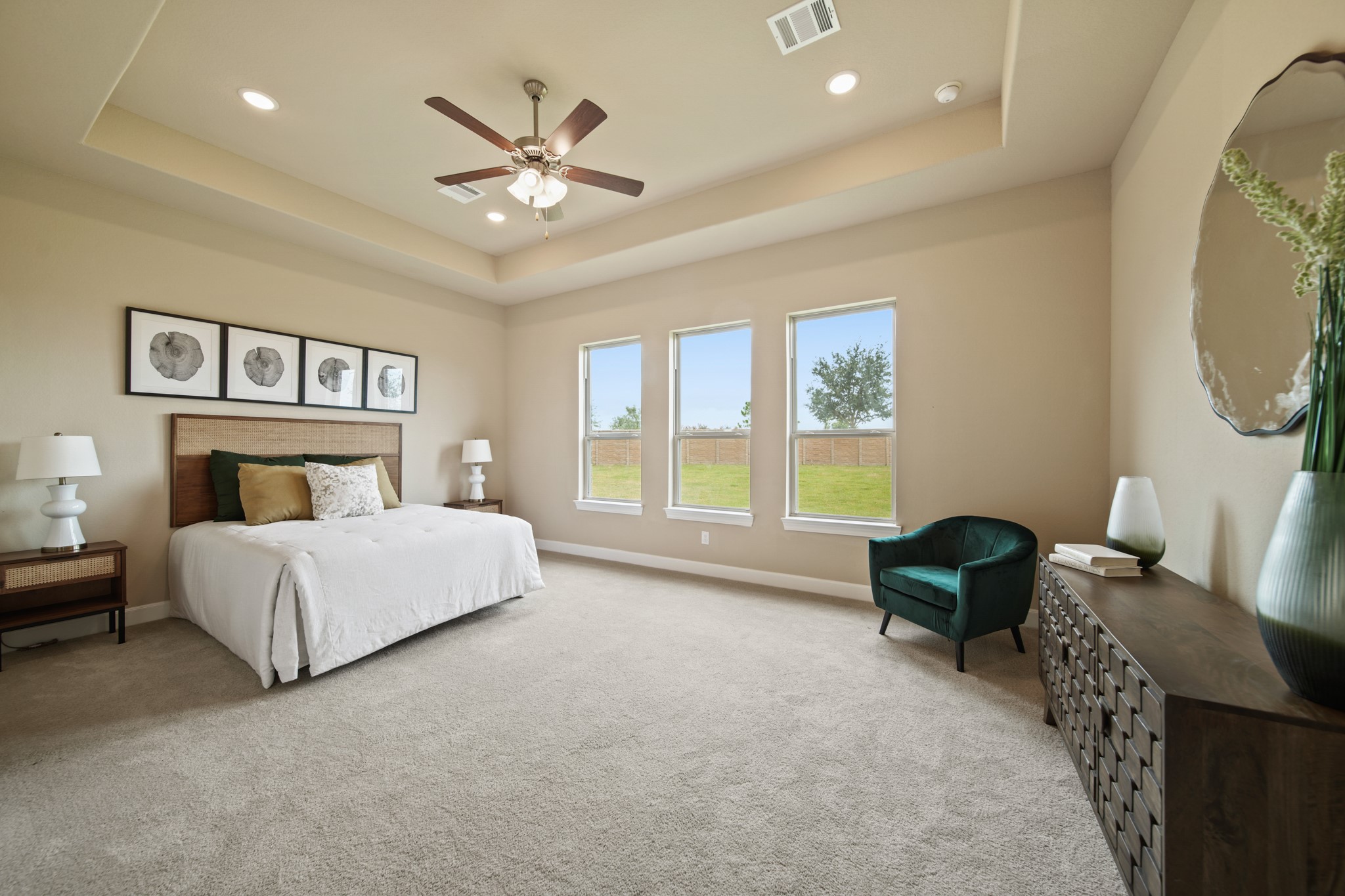 5602 Caracara Street Manvel, TX 77578 - Photo 8 of 15 a bed room with a bed and a chair