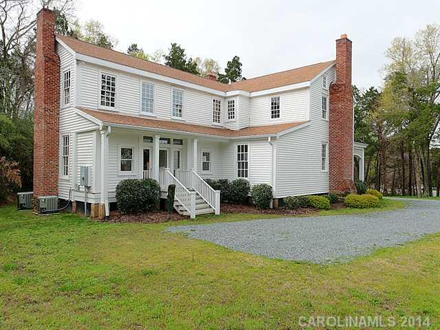 6701 Providence Road Charlotte, NC 28270 - Photo 13 of 13 a view of a house with a yard and sitting area