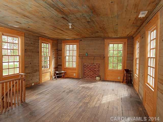 6701 Providence Road Charlotte, NC 28270 - Photo 9 of 13 an empty room with windows