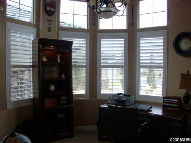 10115 Burghley Lane Reno, NV 89521 - Photo 8 of 9 a living room with furniture and a window